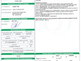 a green and white document with a picture of a person on it