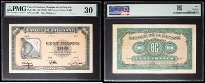 three different types of currency are on display in a display case