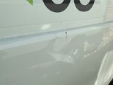 a close up of the side of a train with the word co written on it