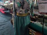 a dress on a mannequin in a clothing store