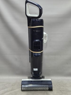 une image d'un aspirateur posé sur une table