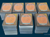 a lot of cards that are stacked on top of each other