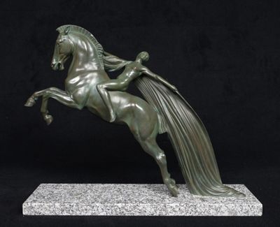 statue of a horse with a long mane on a marble base