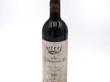 a bottle of wine that is sitting on a table