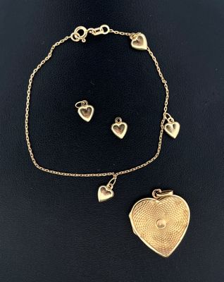 Ensemble en or jaune 750 millièmes commprenant un pendentif et un brac - Photo 1