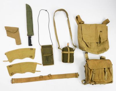 an assortment of military items including a knife, pouch, belt, and other items