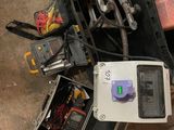 a box full of electrical equipment sitting on the floor