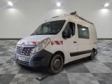 a white van that is parked on a checkered floor