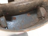 a close up of a metal object with rust on it