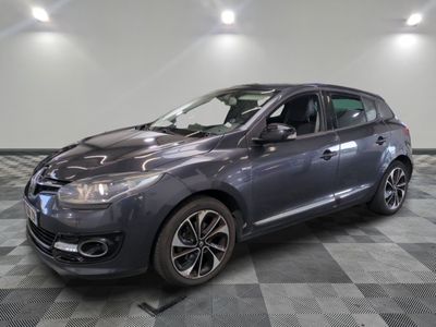 a picture of a gray car parked in a showroom