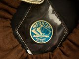 a badge on the back of a jacket that says woodlakes