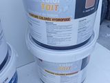 three buckets of paint sitting on top of a table next to each other