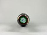 an image of a close up of a bottle of beer on a white surface