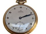 a close up of a gold pocket watch on a white background