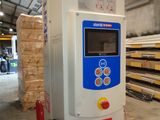 a machine that is sitting inside of a warehouse