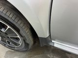 a close up of a car ' s tire with a flat tire