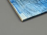 a picture of a book with a blue cover on a table