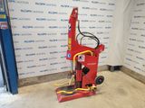 an image of a red machine in a room