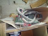 a cardboard box with a bunch of items in it