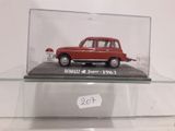 a red car in a glass display case on a shelf