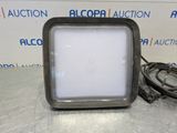 a close up of a square light on a table