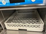 a dishwasher that has a rack in it
