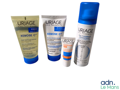 une photo d'un ensemble de produits de soins de la peau sur fond blanc