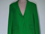 green blazer jacket on a mannequin mannequin mannequin mannequin mannequin mannequin mannequin mannequin manne