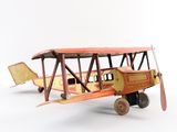 a toy airplane that is sitting on a white surface