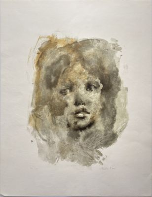 an image of a drawing of a woman ' s face on a piece of paper