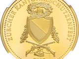 a close up of a gold coin with a coat of arms on it