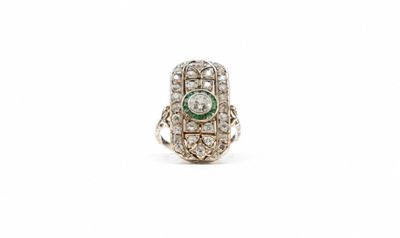 an emerald and diamond ring