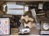 a box filled with assorted items and a clock