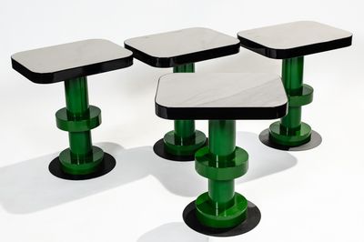three tables that are sitting on top of each other