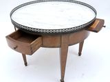 an image of a marble top coffee table with a drawer underneath it