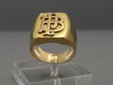 an image of a gold ring with the letter p on it