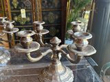 a lot of candles that are sitting on a table