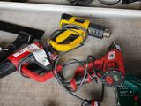 many tools that are laying out on the floor