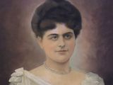 portrait of a woman in a white dress with a pearl necklace and pearl necklace