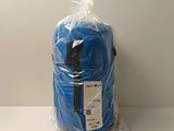 the blue blanket is wrapped in plastic and ready to be used
