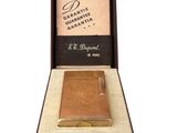 an image of a gold plated cigarette case in a presentation box