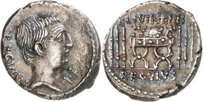 a silver coin with an image of a man on it