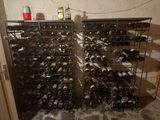many bottles of wine on the shelves in the room