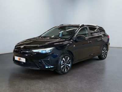 the toyota corollant is parked in a large room