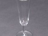 a wine glass that is sitting on a table