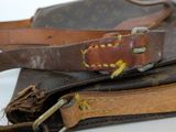 a brown and tan bag with a brown strap