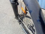 a close up view of a bicycle tire on the street
