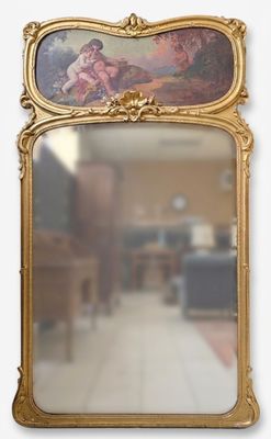 a mirror that has a picture of a woman on it