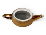 brown and white ceramic teapot with handle on a white background