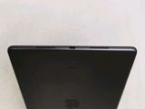 an apple ipad is sitting on a white surface with a white background